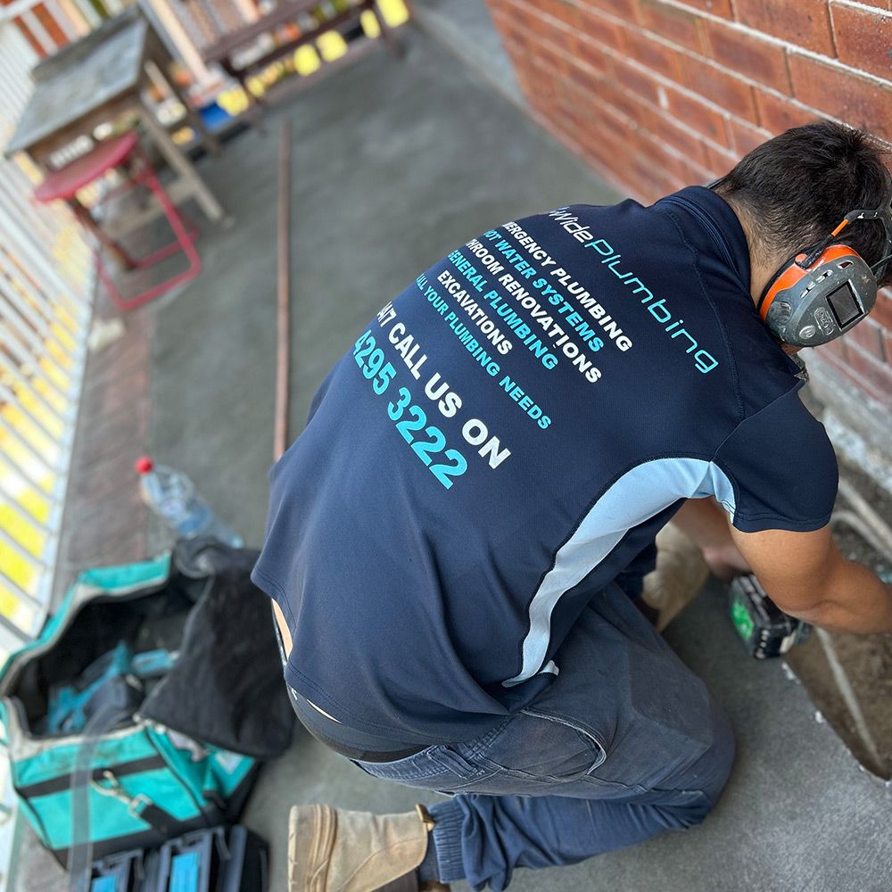 Plumber working at a home