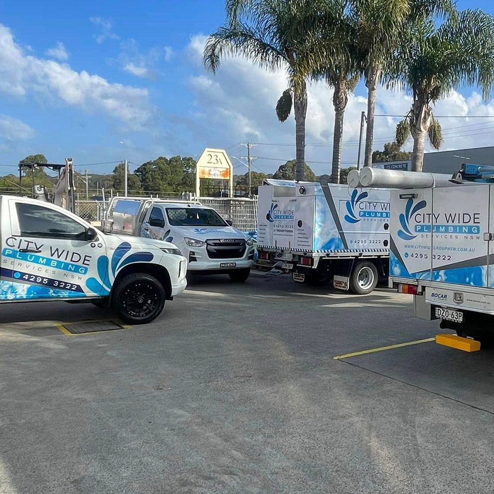 CityWide Plumbing trucks lined up at the depot